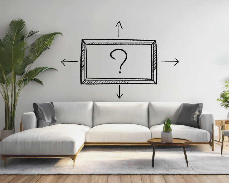 How to hang artwork above a couch